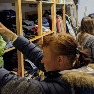 Refugees find clothing at a local church